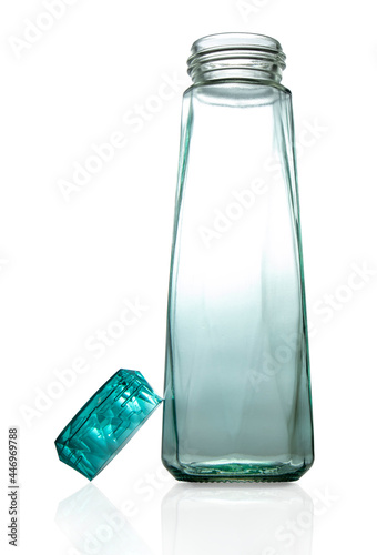 clear blue crystal bottle on white background