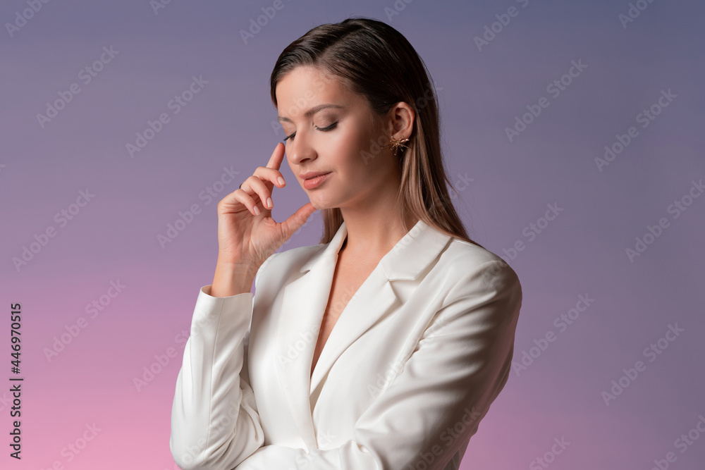 stylish young woman in a trendy white jacket was thinking,