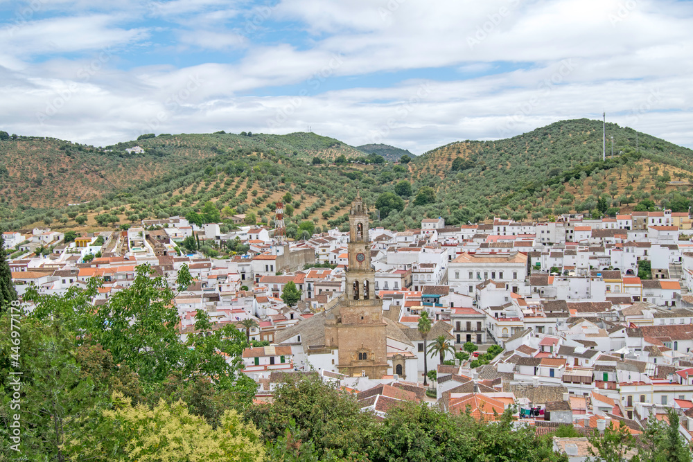 Constantina, one of the most beautiful villages of the North Seville Mountain with the church in the center of the photo, Andalusia, Spain