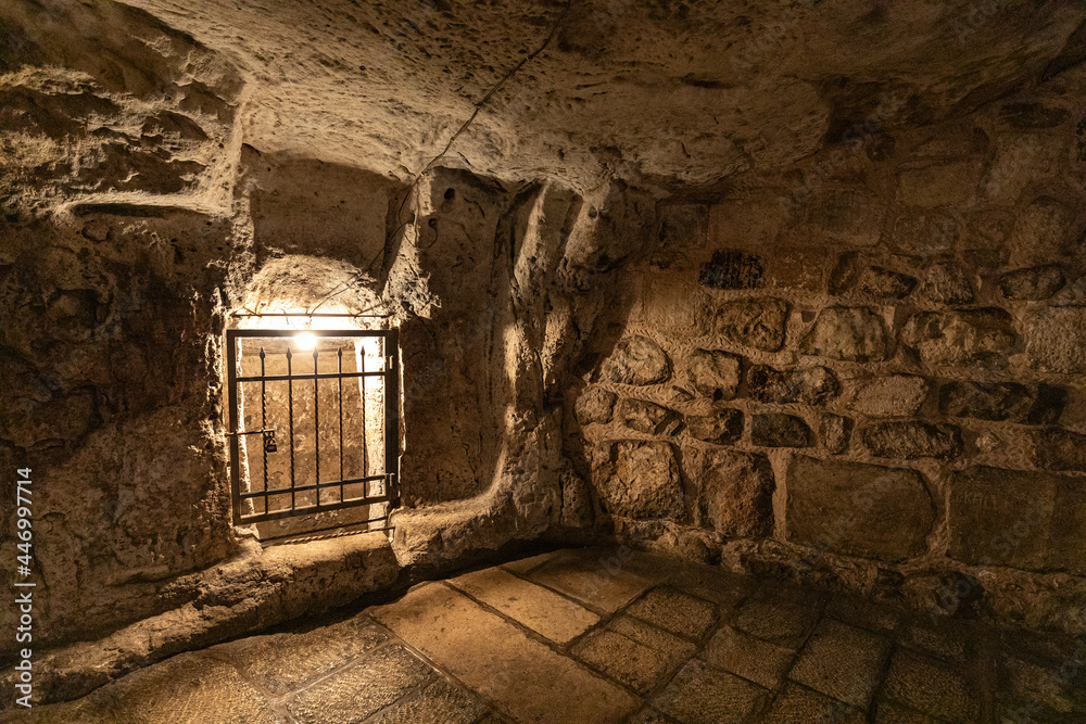 Fototapeta premium Underground Greek Orthodox Partorium Church, Prison of Christ, Thieves and Baraba prison, at Via Dolorosa street in Jerusalem Old City in Israel