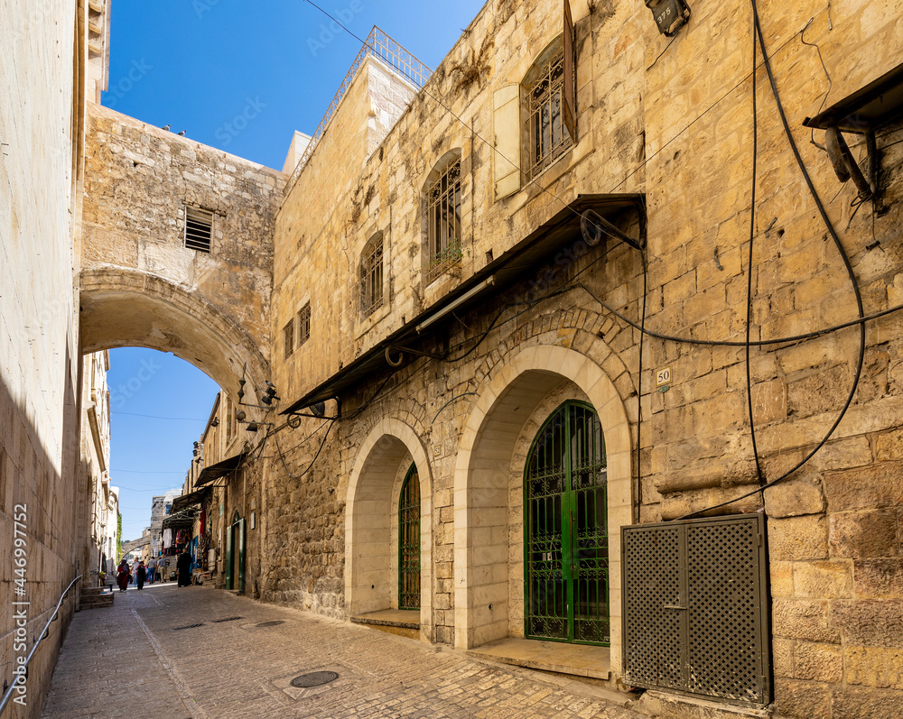Fototapeta premium Ecce Homo Arch, remaining of ancient roman emperor Hadrian Aelia Capitolina quarter at Via Dolorosa street in Jerusalem Old City in Israel