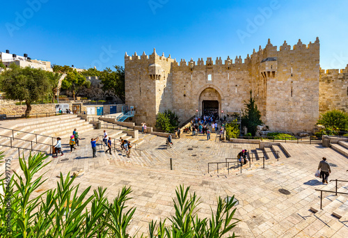 Damascus Gate of ancient Old City walls leading to bazaar marketplace of Muslim Quarter of Jerusalem in Israel