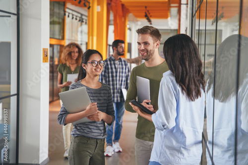 Enthusiastic young people working for persepctive modern company photo