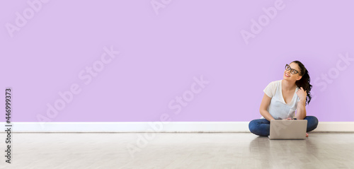 Young woman using her laptop