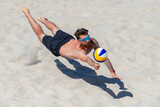 Professional beach volleyball player in action, receiving the ball. Horizontal sport poster, greeting cards, headers, website