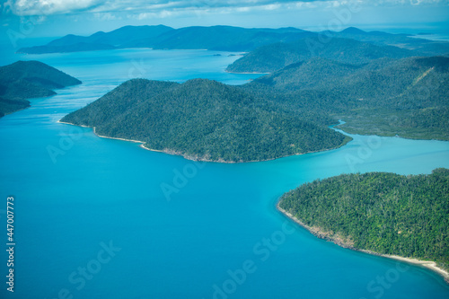 Aerial view of Whitsunday Islands National Park from the aircraft. photo
