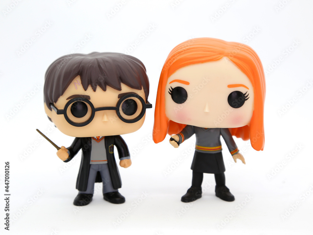 Funko Pop Ginny Weasley and Harry Potter in their Hogwarts School