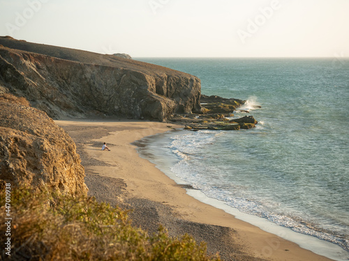 Obraz na płótnie View of the Waves of the Sea coming Strongly Towards the Shore with a Lot of Foam in Punta Gallinas, Uribia, La Guajira, Colombia w salonie