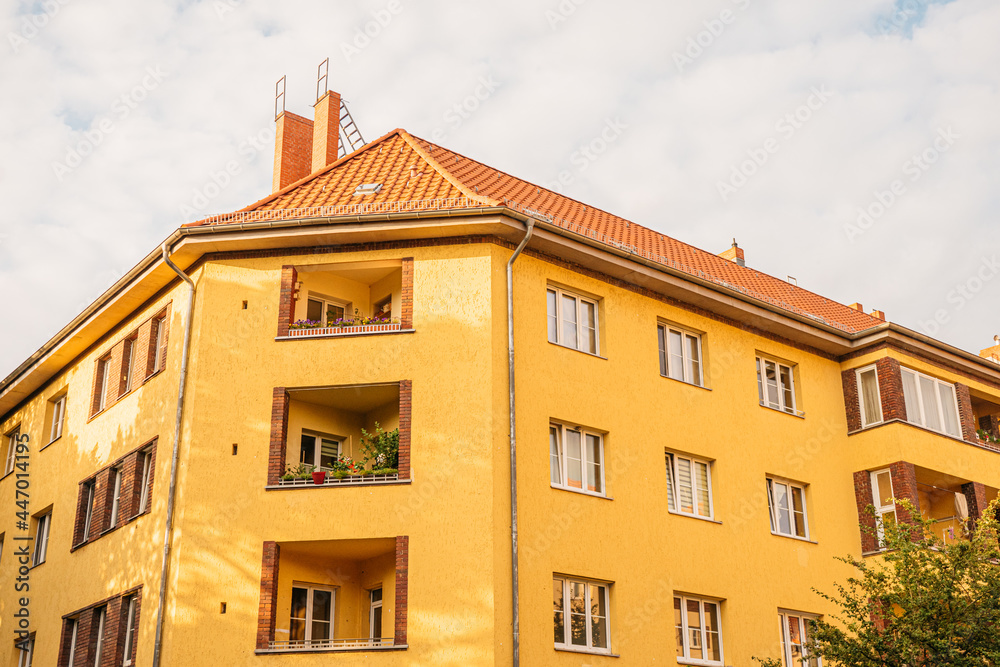 orange apartment house at prenzlauer berg, berlin