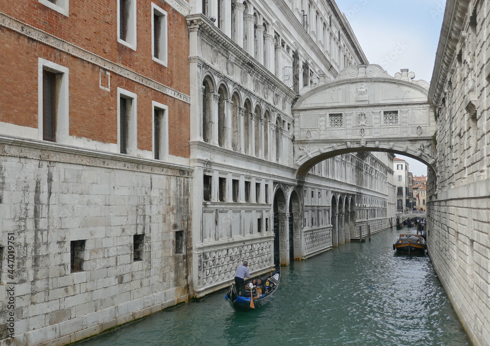 The Bridge of Sighs over a Venetian canal.

