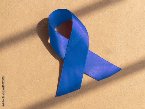 Blue ribbon. Medical bow of men health. photo