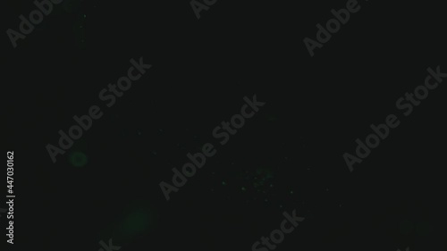 Fluid. Вubbles in Space with Bright Colored Light. Macro.