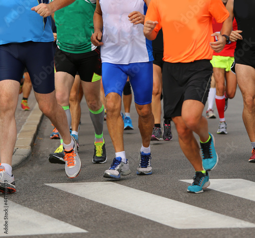 Marathon runners during challenge in the road of the city