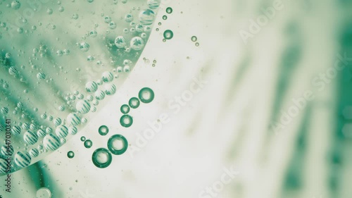 Fluid. Вubbles in Space with Bright Colored Light. Macro.