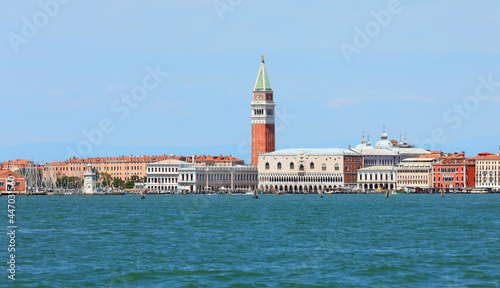 enchanting view of the island of venice from the sea with the bell tower of san marco and the ducal palace with excellent solar lighting