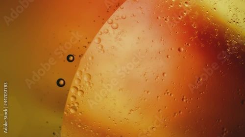 Fluid. Вubbles in Space with Bright Colored Light. Macro.