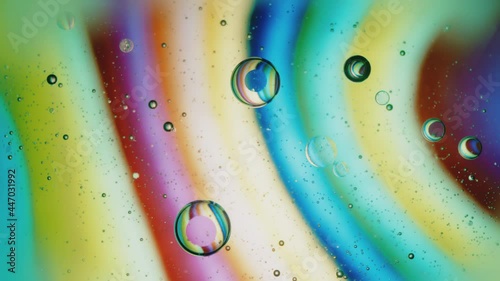 Fluid. Вubbles in Space with Bright Colored Light. Macro.