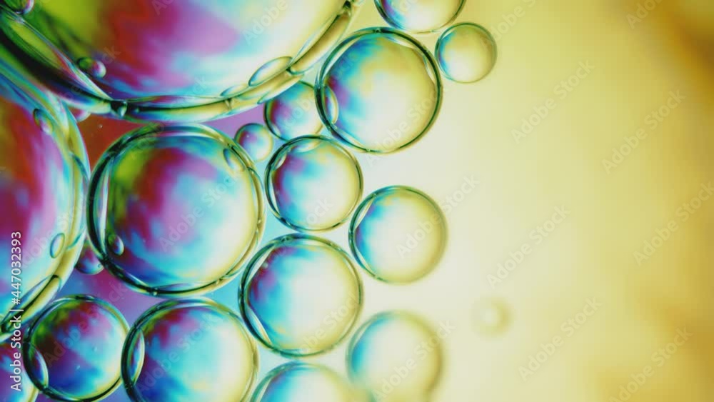 Fluid. Вubbles in Space with Bright Colored Light. Macro. Fluid. Вubbles in Space with Bright Colored Light. Macro.