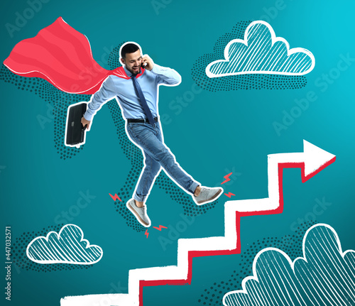 Businessman with cape climb...