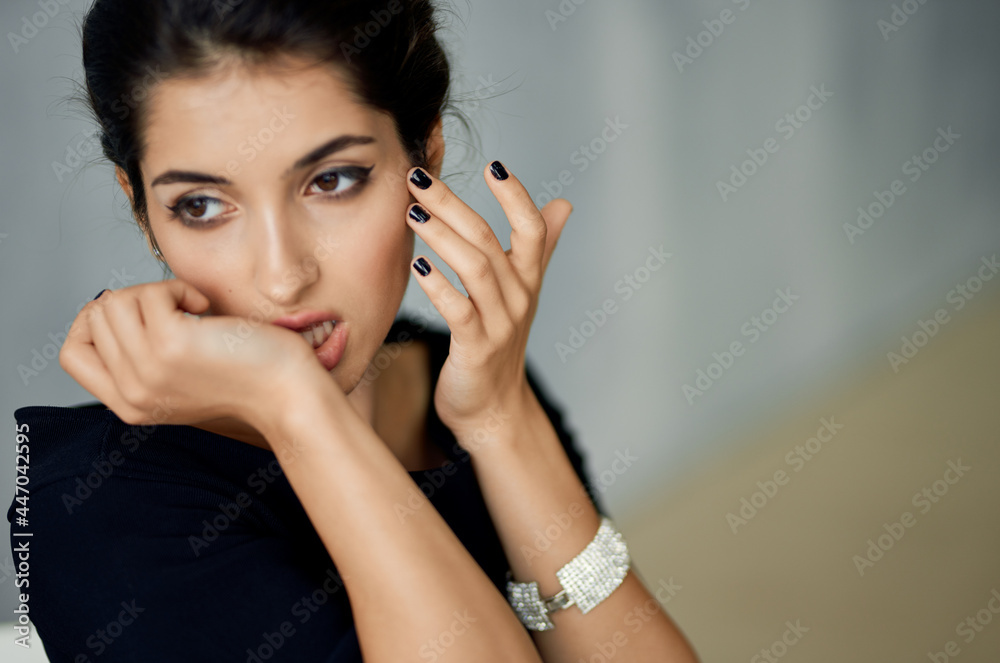 cheerful woman in black dress studio posing fashion makeup cheerful woman in black dress studio posing fashion makeup