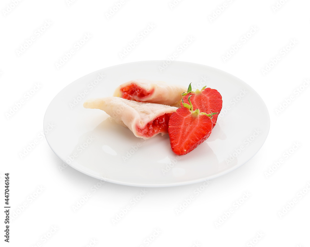 Plate with tasty dumplings and strawberry on white background Plate with tasty dumplings and strawberry on white background