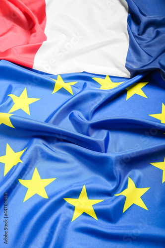 Flags of France and European Union as background, closeup