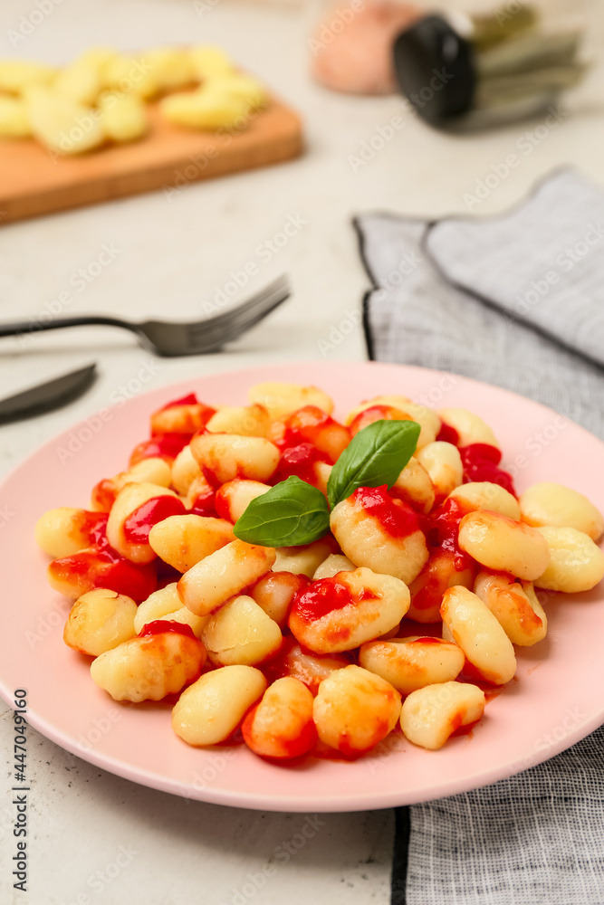 Plate with tasty gnocchi on table Plate with tasty gnocchi on table