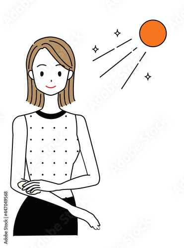 紫外線対策のため日焼け止めを使う女性