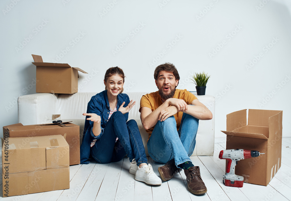 cheerful young couple boxes with things new housing family cheerful young couple boxes with things new housing family