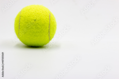 Tennis ball is on white background © thaninee