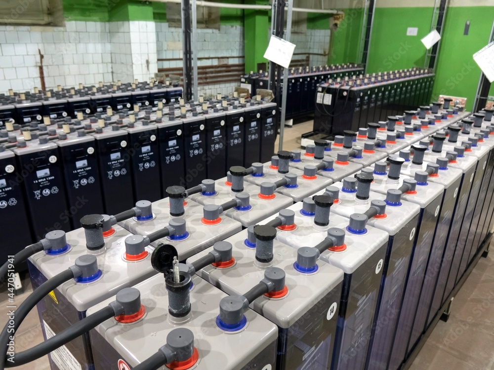 Rows of industrial storage batteries.A room used for backup or uninterruptible power supply.