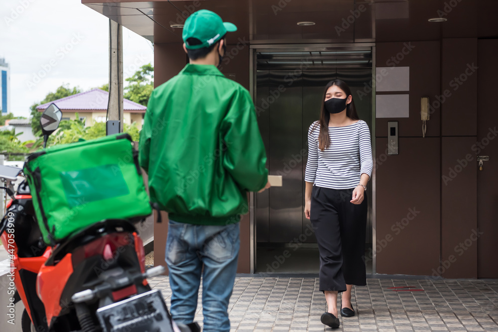deliver pizza to office woman in face mask