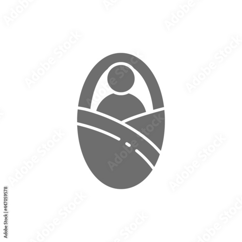 Vector newborn in baby envelope grey icon.