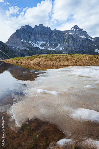 the mountains of the Ossola Valley around dinner time, inside the Alpe Veglia - Devero Natural Park, near the town of Baceno, Italy - July 2021. photo