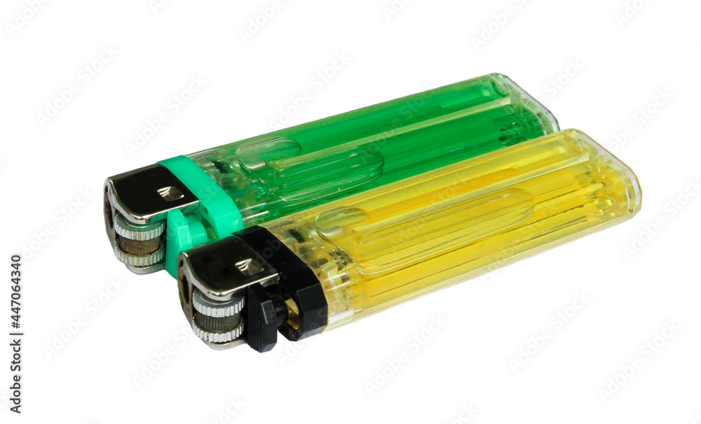 Green & Yellow plastic gas lighter isolated on white background Green & Yellow plastic gas lighter isolated on white background