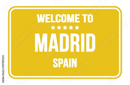 WELCOME TO MADRID - SPAIN, words written on yellow street sign stamp