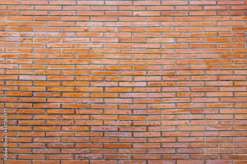 Old dirty orange brick wall surface.