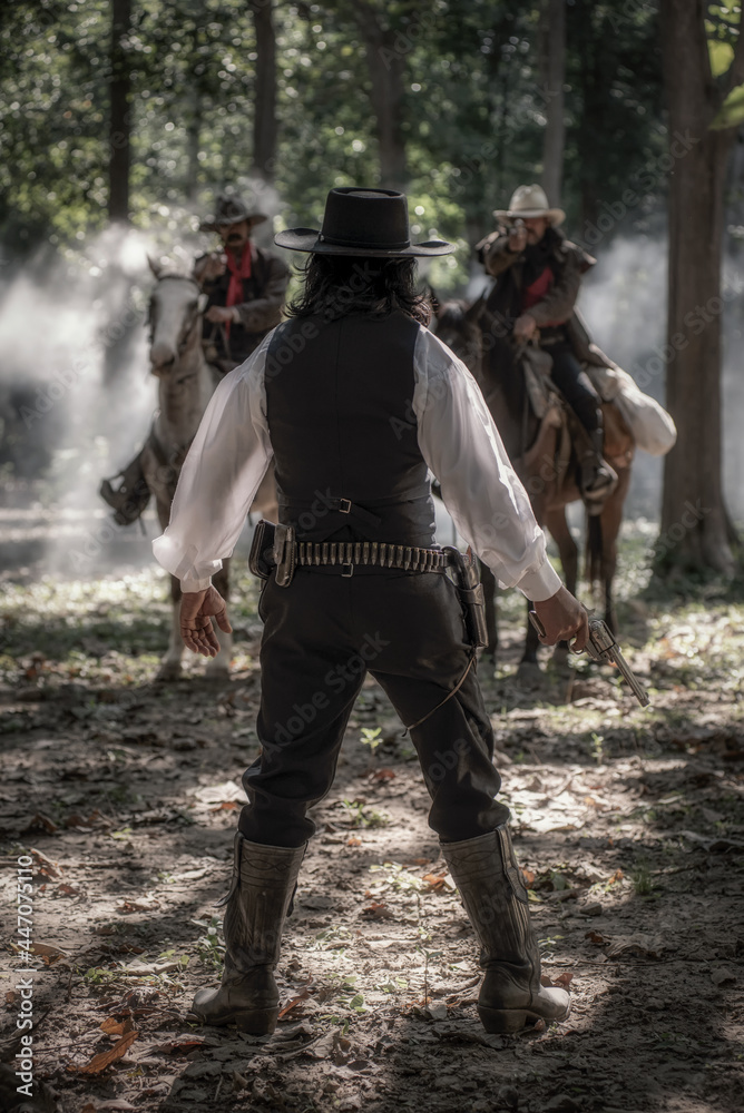 The confrontation of sheriff with two bank robbers that are on riding horse but meet sheriff before escape and are preparing for a gun fight. Cowboy concept. The confrontation of sheriff with two bank robbers that are on riding horse but meet sheriff before escape and are preparing for a gun fight. Cowboy concept.