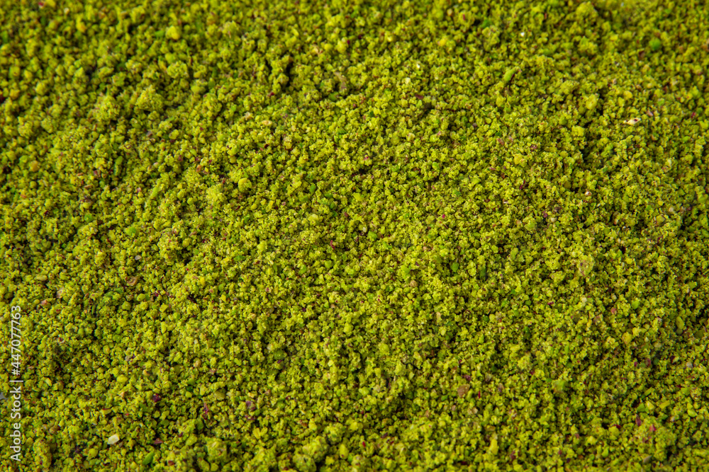 Pistachio ground, flour or powder. Healthy dietary nutritional product. Vegetable nut protein. Vegetarian balanced meal. Selective focus