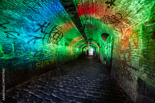 Colorfully lit tunnel from Ganzemarkt to Oudegracht in the city center of Utrecht, Utrecht Province, The netherlands © Holland-PhotostockNL