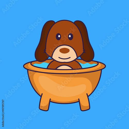 Cute dog taking a bath in the bathtub.