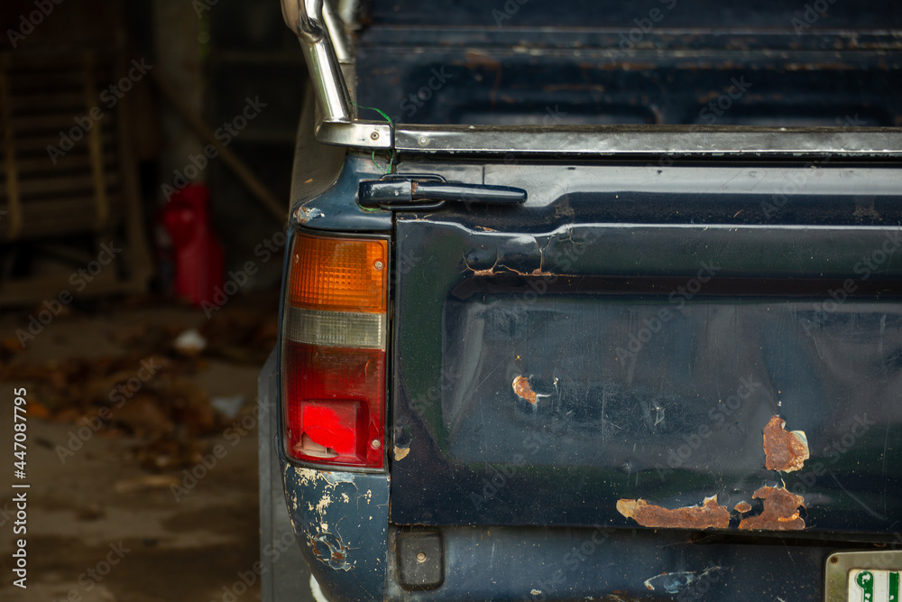 the back of an old blue pickup truck the back of an old blue pickup truck