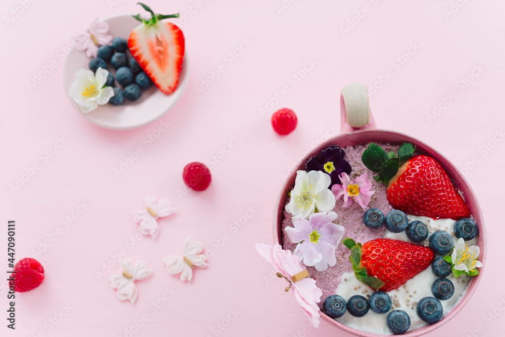 Overhead shot of a delicious chia pudding with berries in a bowl