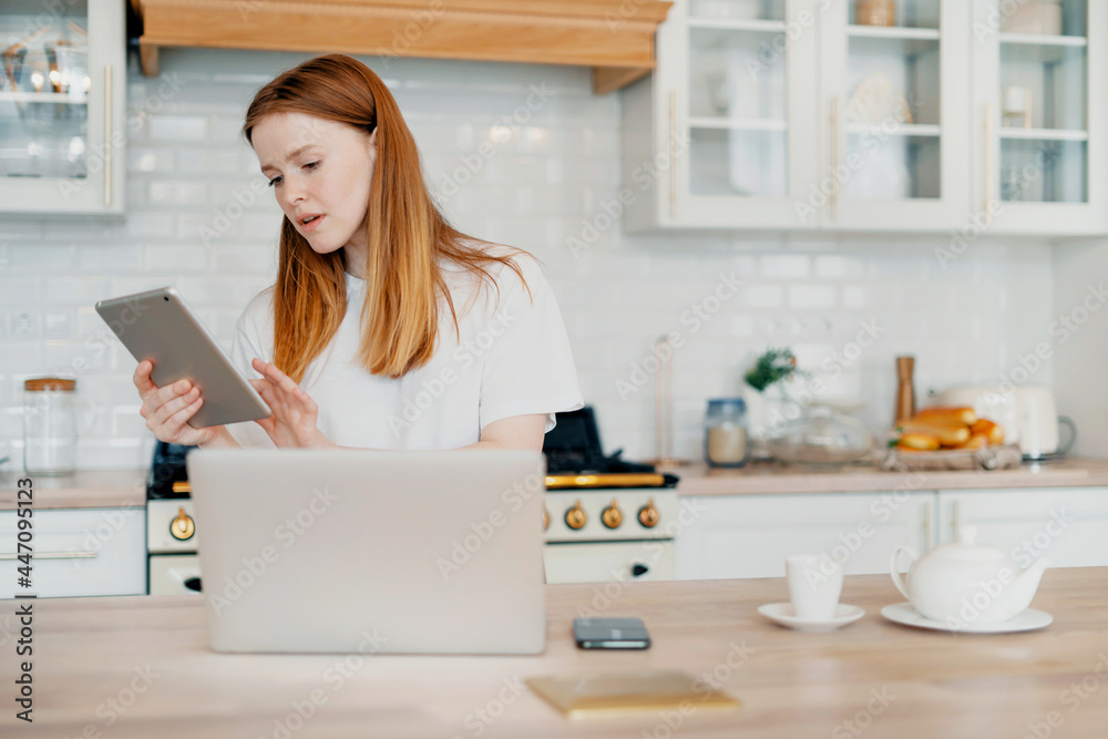 A smart student does tasks remotely online on the Internet. A young female freelance blogger works at home on a laptop. Writes a letter to clients by email. A smart student does tasks remotely online on the Internet. A young female freelance blogger works at home on a laptop. Writes a letter to clients by email.