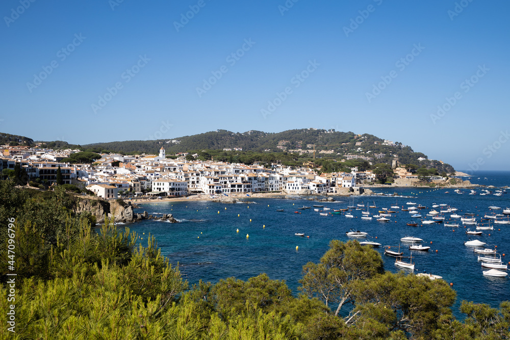 View on the village Calella de Palafrugell, bay with boats in Costa Brava, Spain