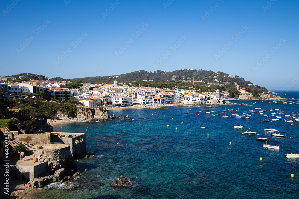 View on the village Calella de Palafrugell, bay with boats in Costa Brava, Spain