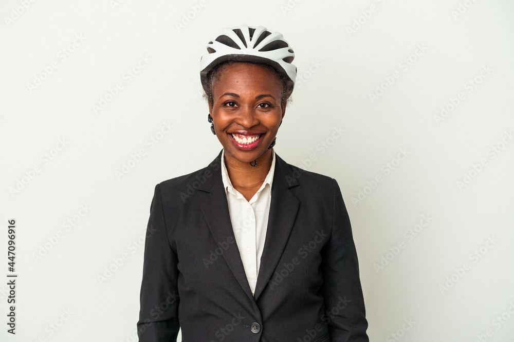 Young business african american woman wearing a bike helmet isolated on white background happy, smiling and cheerful. Young business african american woman wearing a bike helmet isolated on white background happy, smiling and cheerful.