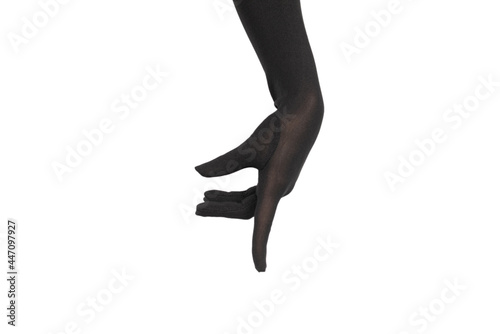 Woman in long black gloves pointing on something isolated on a white background