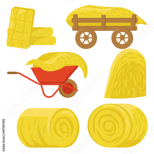 Hay in rolls, haystacks on various wheelbarrows and carts