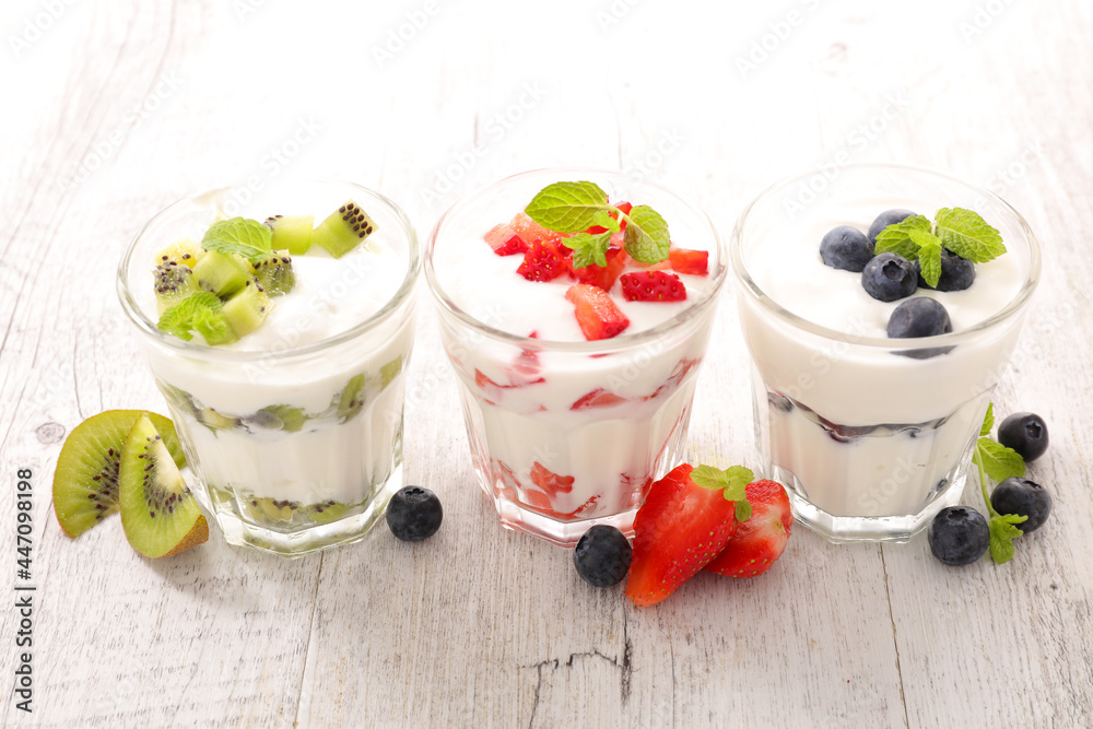 glasses of yogurt and berries fruits glasses of yogurt and berries fruits